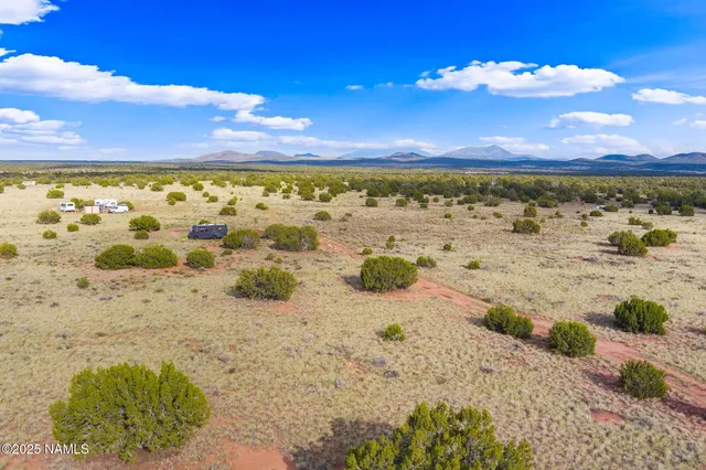 a view of a lake with a beach