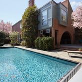 a view of house with yard