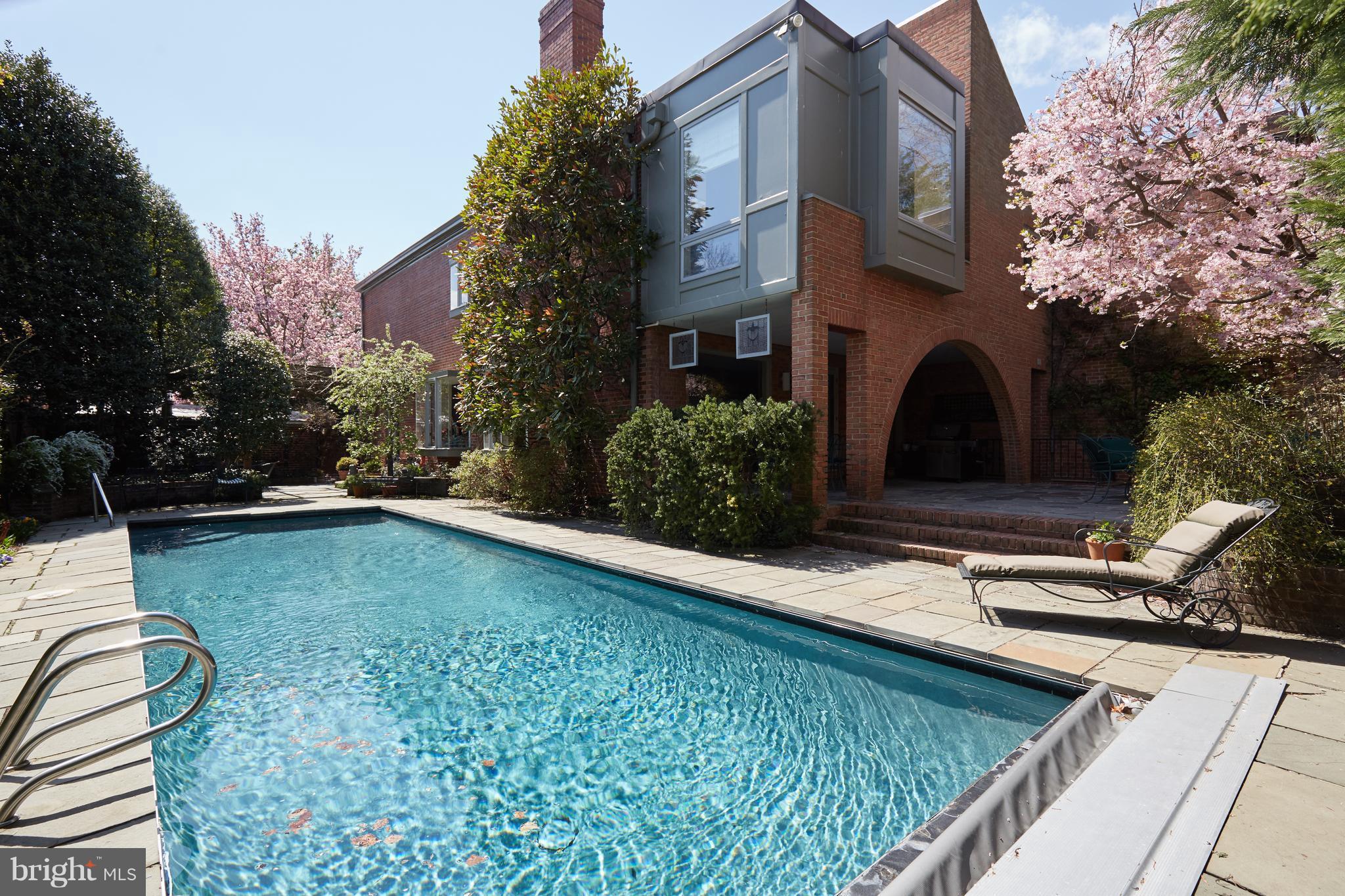 3033 West Ln Keys Northwest Washington, DC 20007 - Photo 1 of 30 a view of house with yard