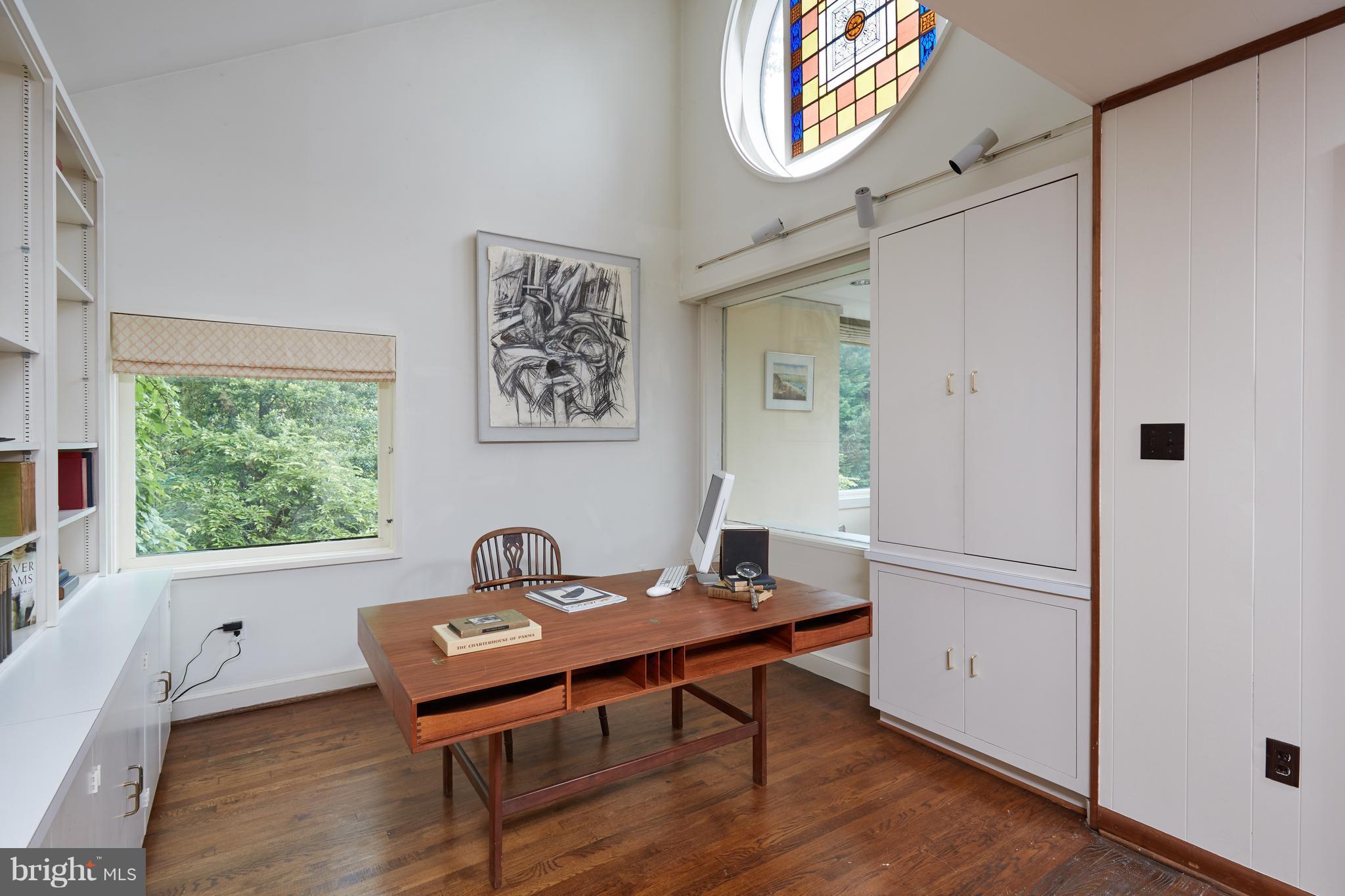3033 West Ln Keys Northwest Washington, DC 20007 - Photo 20 of 30 a view of a workspace with furniture and a window