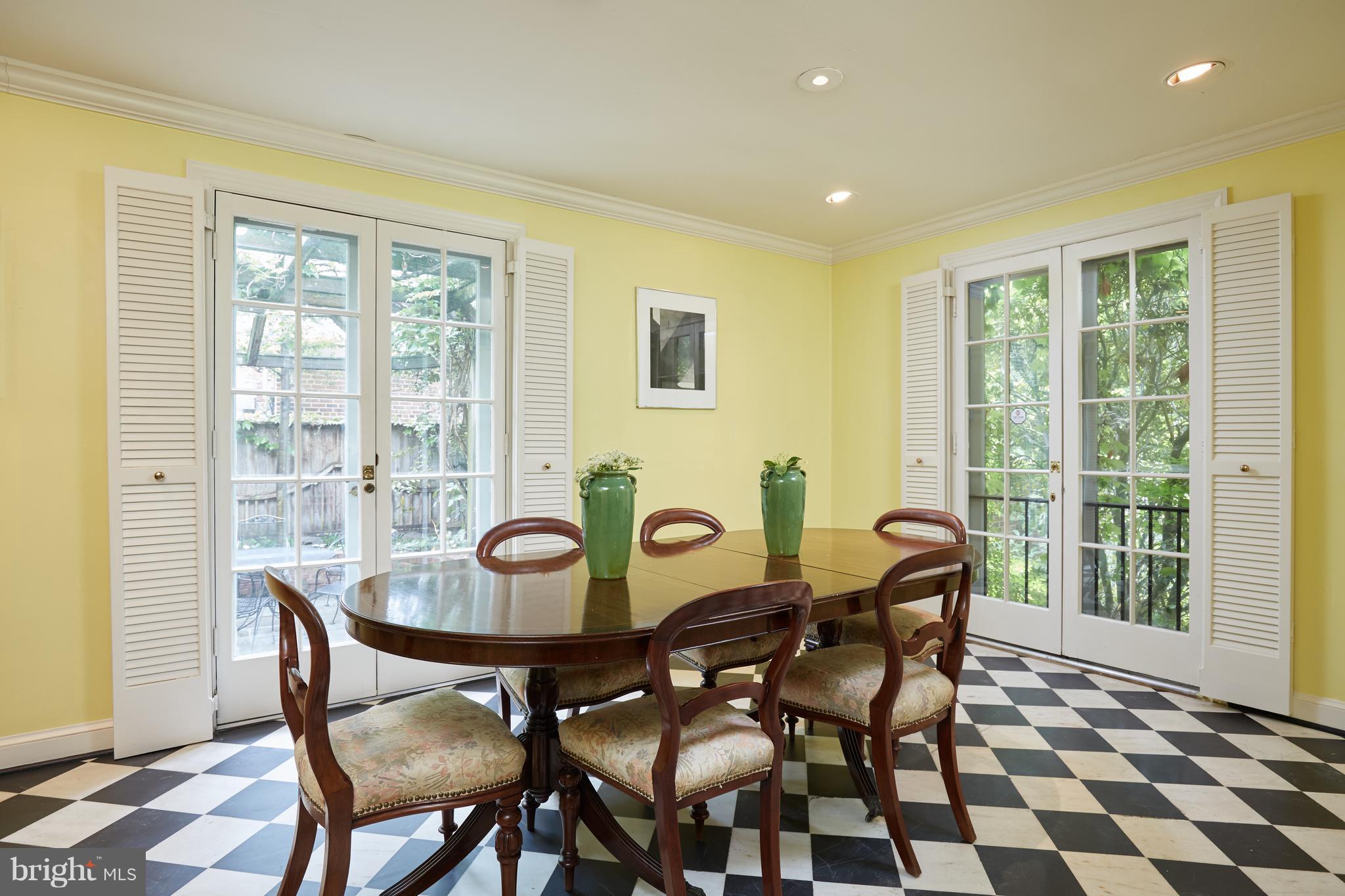 3033 West Ln Keys Northwest Washington, DC 20007 - Photo 10 of 30 a dining room with furniture and wooden floor