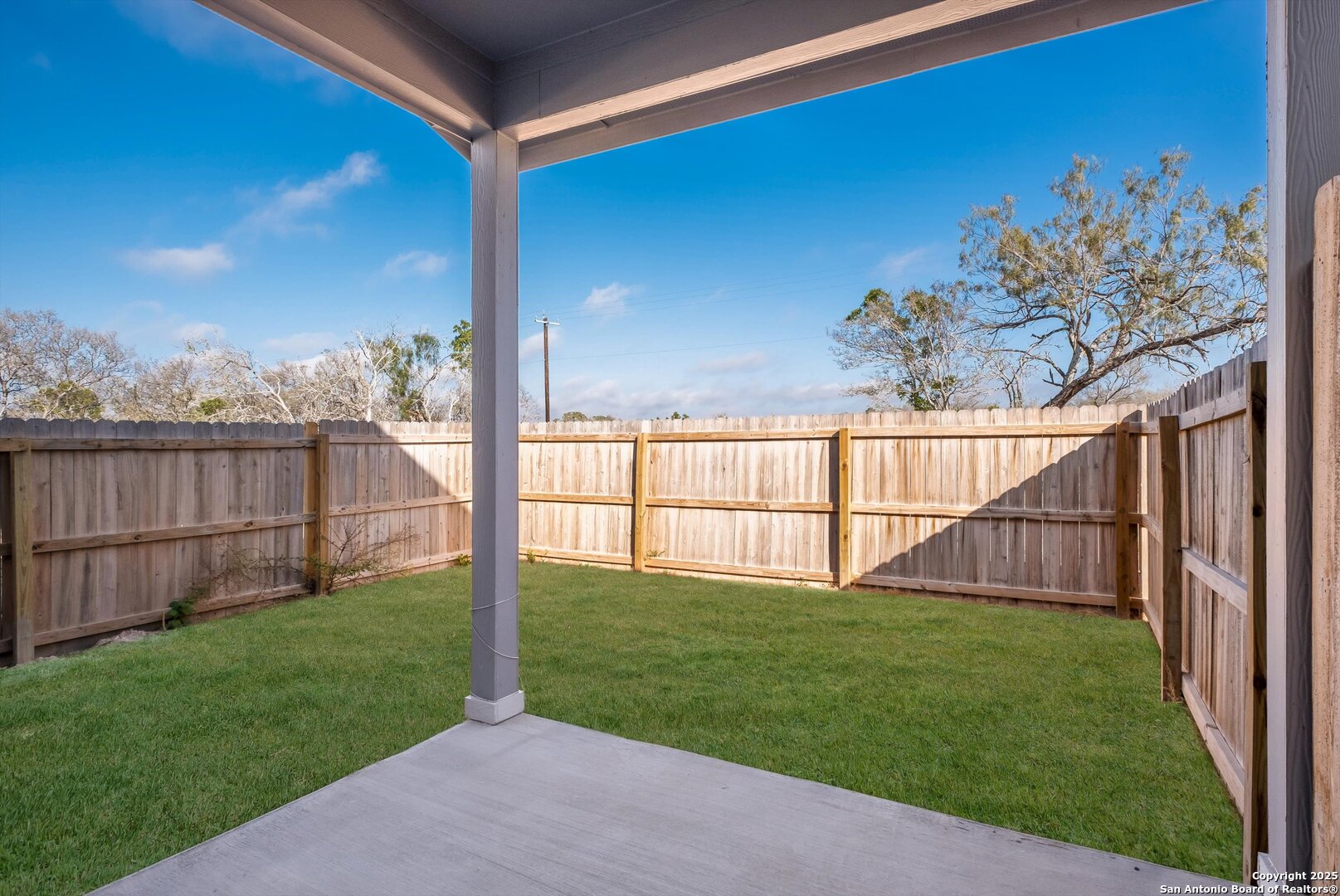 514 Abigail Alley San Antonio, TX 78253 - Photo 15 of 17 a view of a backyard with wooden fence