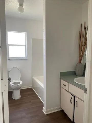 a bathroom with a sink and a toilet