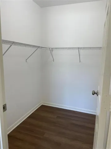 a view of an empty walk in closet