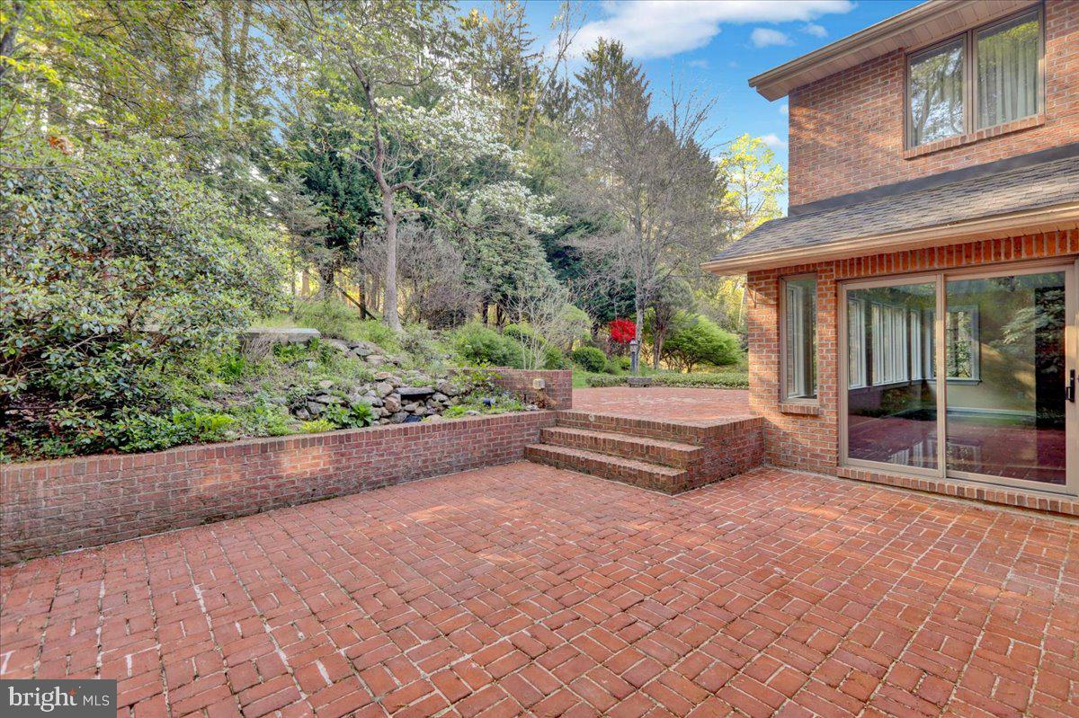 34 Hessian Boulevard Reading, PA 19607 - Photo 11 of 69 a view of patio with a table and chairs and potted plants