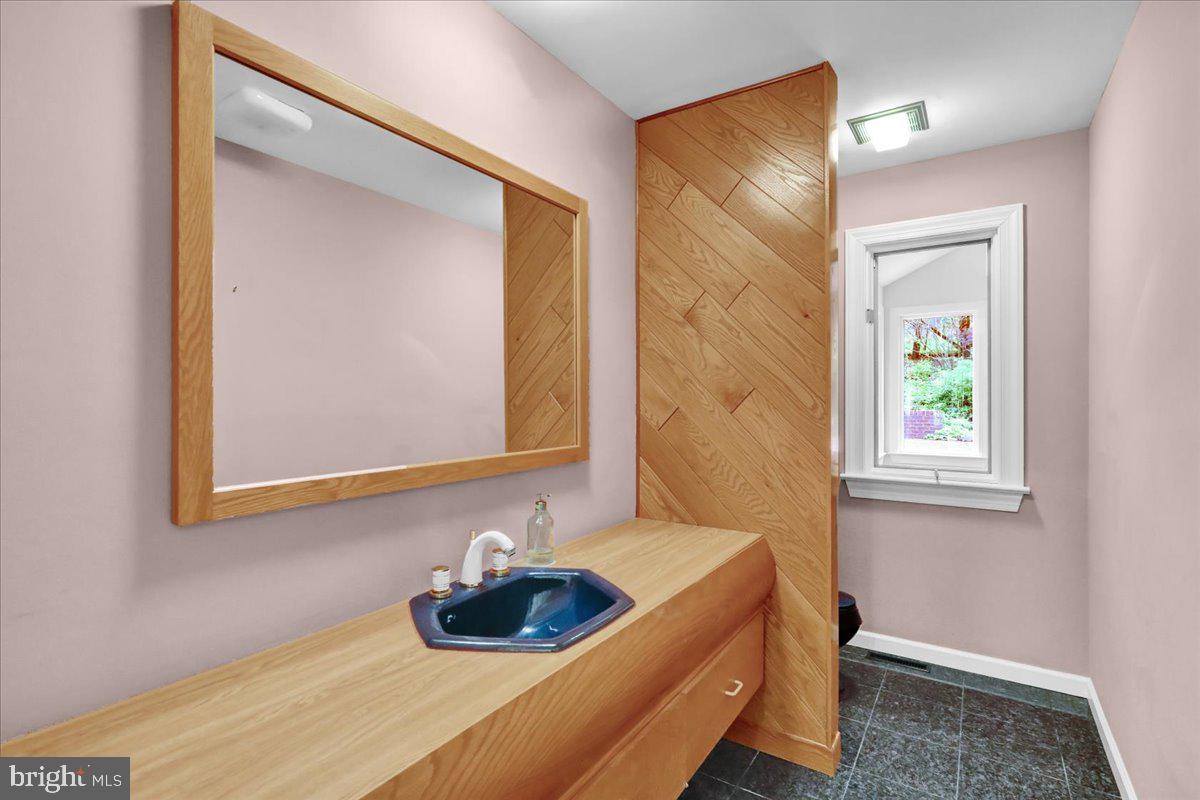34 Hessian Boulevard Reading, PA 19607 - Photo 27 of 69 a bathroom with a sink and a mirror