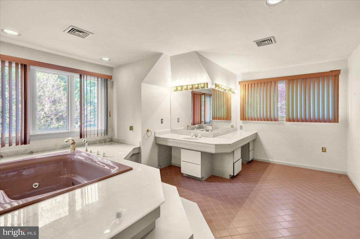 34 Hessian Boulevard Reading, PA 19607 - Photo 44 of 69 a bathroom with a sink double vanity and a bathtub