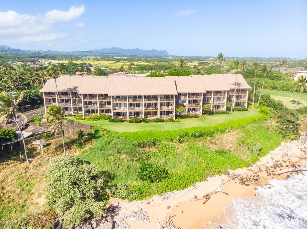 320 Papaloa Road, Unit 213 Kapaa, HI 96746 - Photo 1 of 25 a view of a city with tall buildings