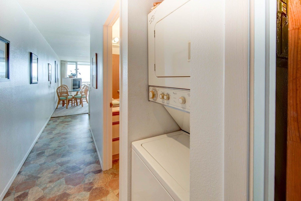 320 Papaloa Road, Unit 213 Kapaa, HI 96746 - Photo 12 of 25 a view of hallway with wooden floor