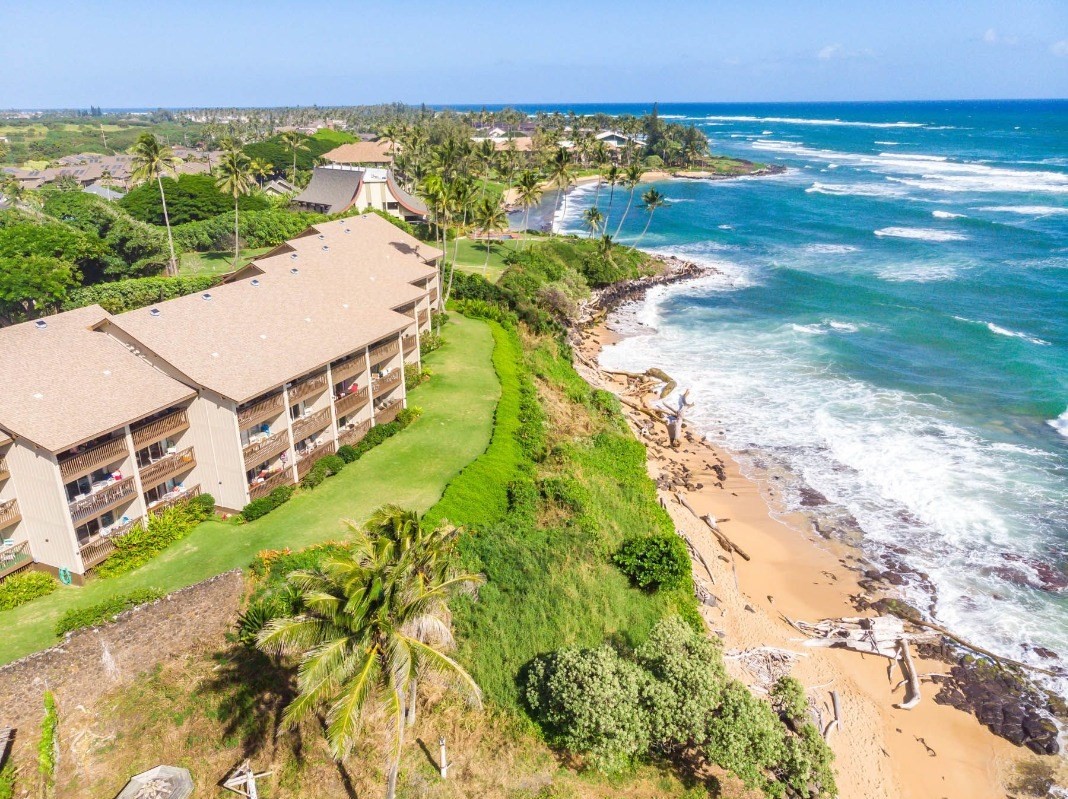 320 Papaloa Road, Unit 213 Kapaa, HI 96746 - Photo 18 of 25 a view of a lake with a yard