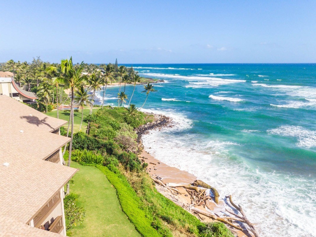 320 Papaloa Road, Unit 213 Kapaa, HI 96746 - Photo 20 of 25 a view of a lake with a yard