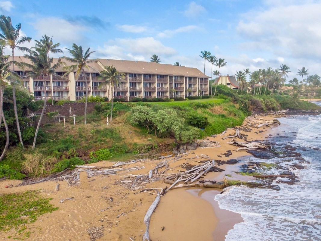 320 Papaloa Road, Unit 213 Kapaa, HI 96746 - Photo 21 of 25 a view of a house with a yard and pathway