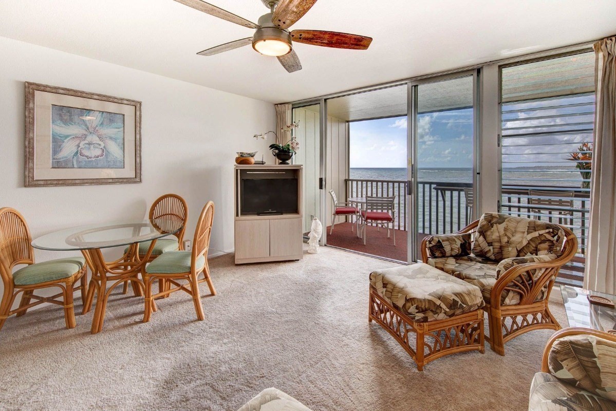 320 Papaloa Road, Unit 213 Kapaa, HI 96746 - Photo 24 of 25 a bedroom with furniture and a window