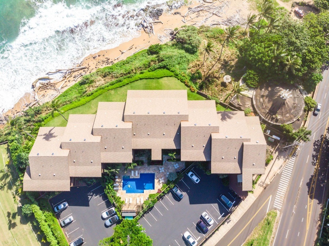 320 Papaloa Road, Unit 213 Kapaa, HI 96746 - Photo 3 of 25 an aerial view of residential houses with outdoor space