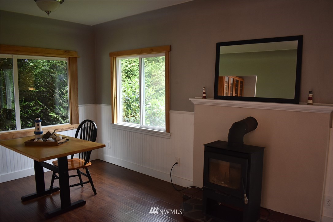 10411 Northeast West Kingston Road Kingston, WA 98346 - Photo 11 of 31 a dining room with furniture and window