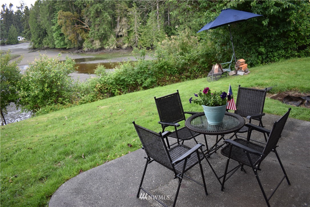 10411 Northeast West Kingston Road Kingston, WA 98346 - Photo 22 of 31 a view of an outdoor sitting area with furniture