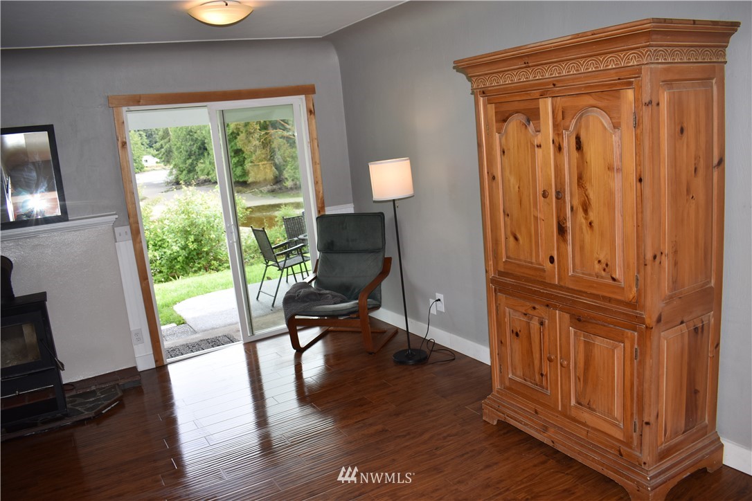 10411 Northeast West Kingston Road Kingston, WA 98346 - Photo 6 of 31 a view of an entryway with wooden floor