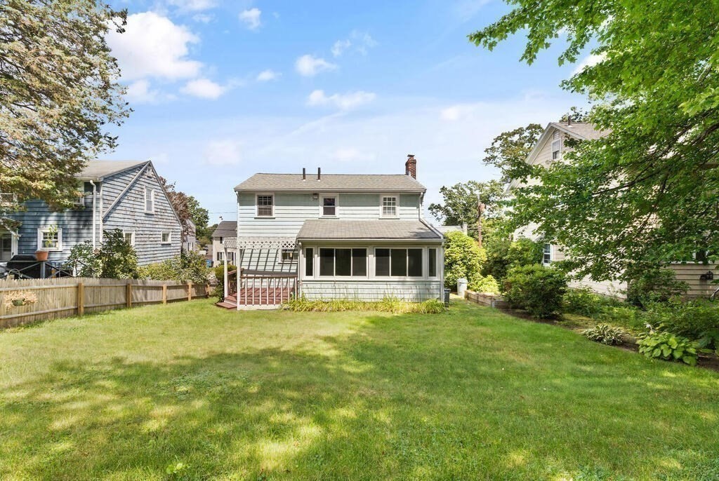 8 Florence Road Waltham, MA 02453 - Photo 28 of 33 a view of a house with a big yard and large trees