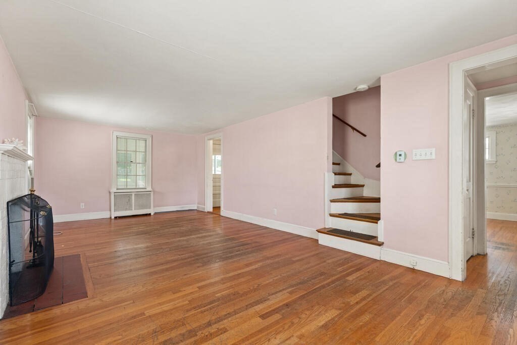 8 Florence Road Waltham, MA 02453 - Photo 5 of 33 a view of empty room with wooden floor and fan