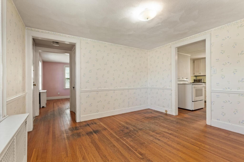 8 Florence Road Waltham, MA 02453 - Photo 9 of 33 a view of a kitchen with wooden floor and a sink