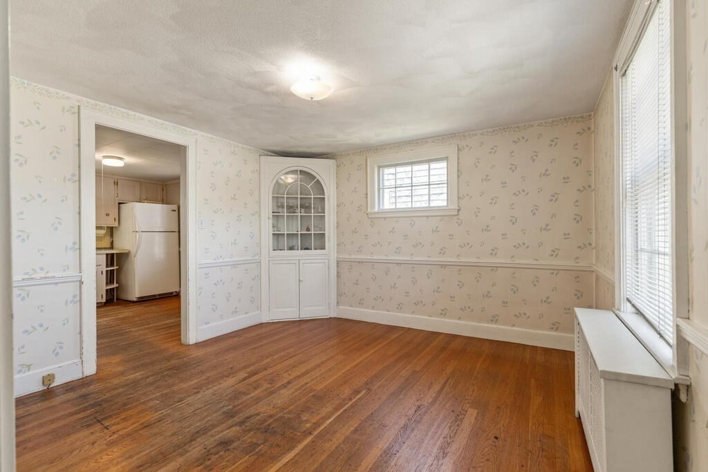 8 Florence Road Waltham, MA 02453 - Photo 10 of 33 wooden floor in an empty room with a window