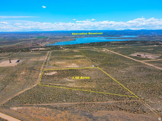 4500 South 22750th Duchesne, UT 84021 - Photo 1 of 34 Expansive 7.50-acre parcel featuring natural desert landscaping and direct access to a reservoir