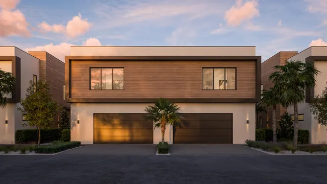 an aerial view of residential building with parking