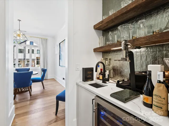 a kitchen with a stove and a table