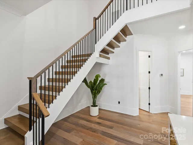 a view of entryway with wooden floor