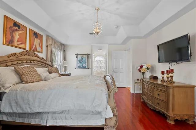 a view of a bathroom with bathtub and shower