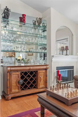 a living room with furniture a rug and a flat screen tv