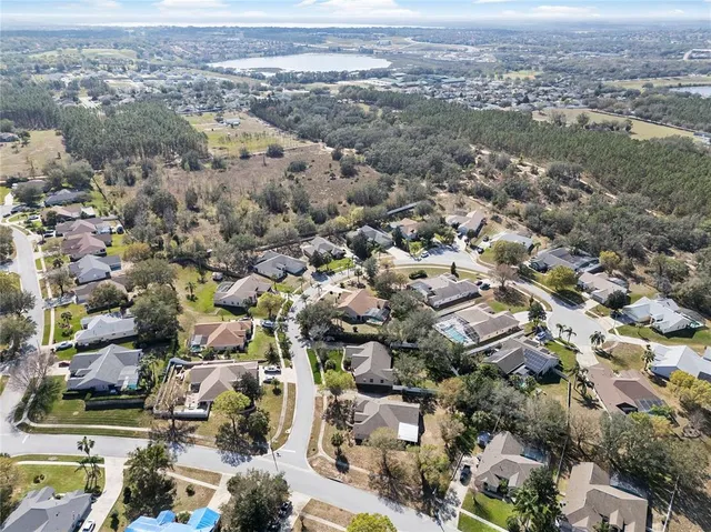 an aerial view of a house with a garden