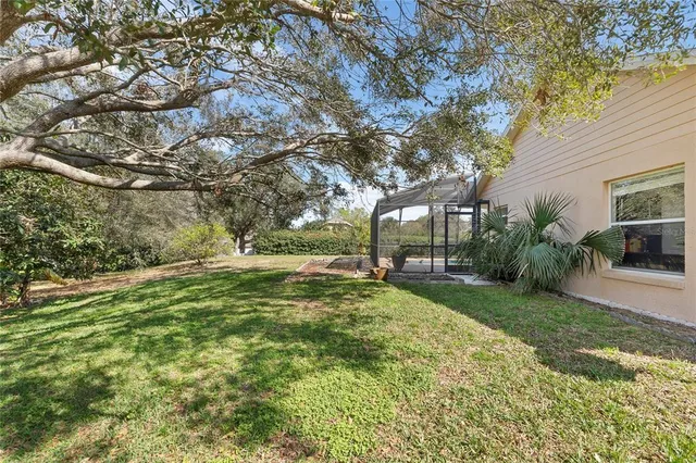 a view of backyard with outdoor space