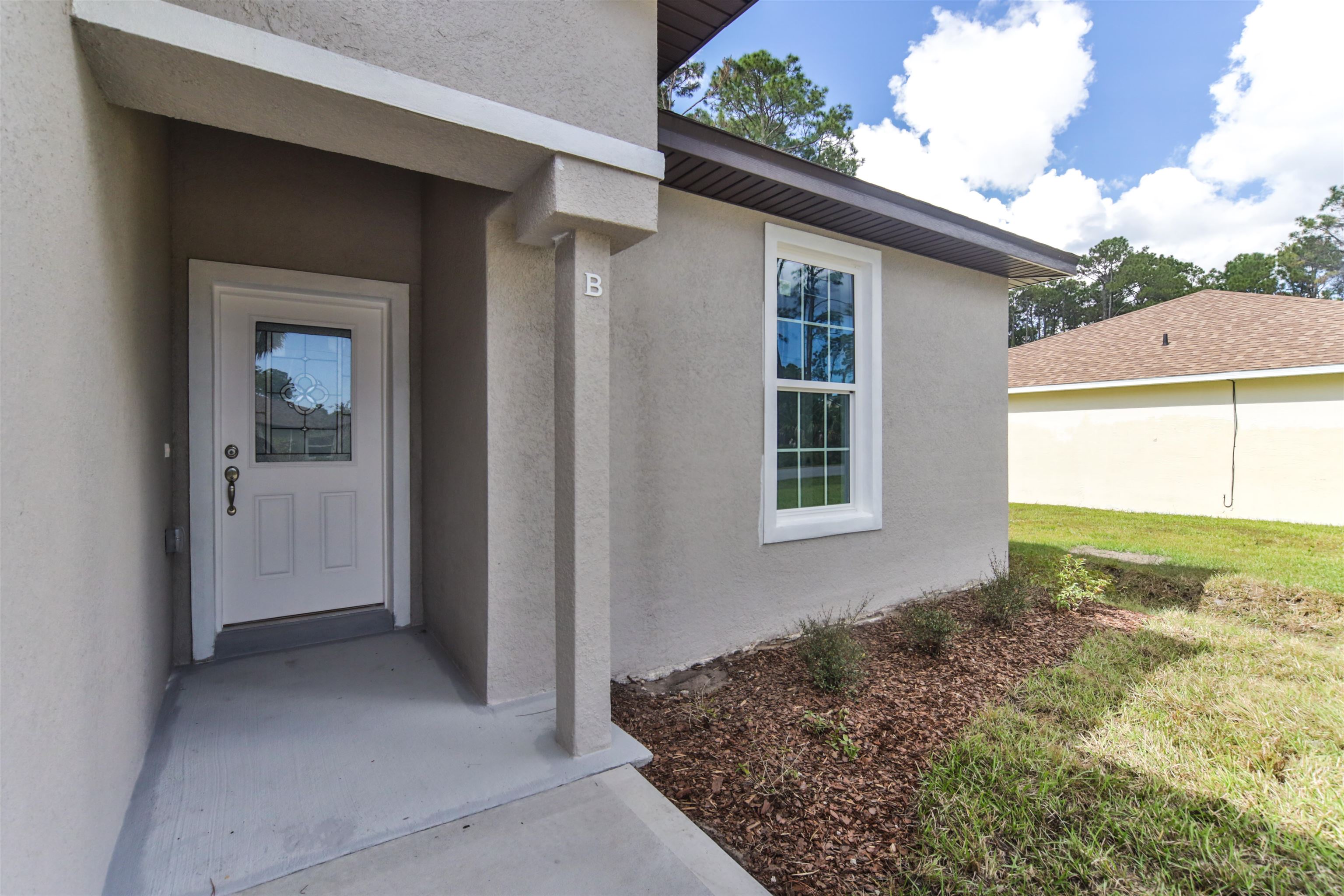 9 Seton Place Palm Coast, FL 32164 - Photo 5 of 37 a view of an house with backyard
