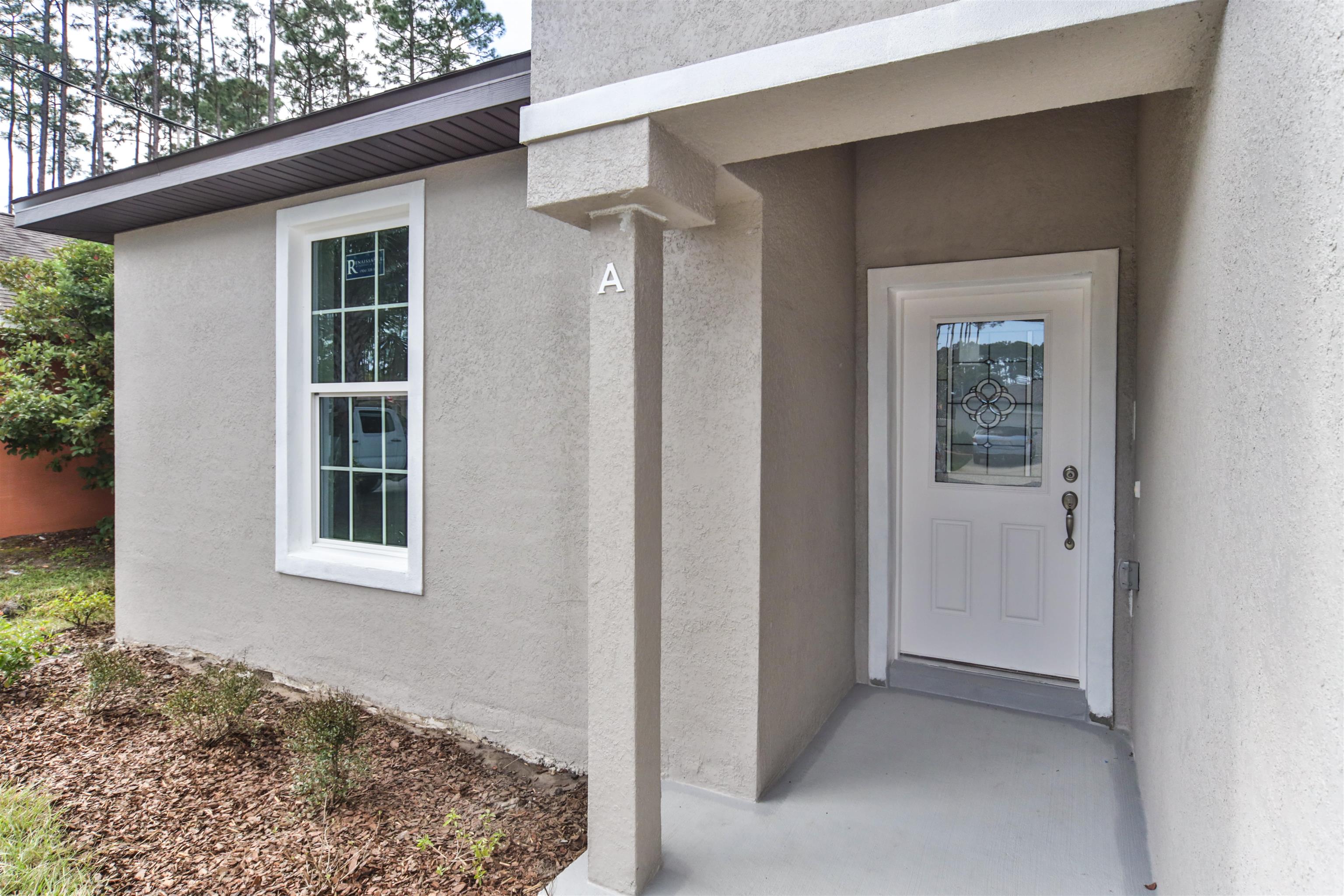 9 Seton Place Palm Coast, FL 32164 - Photo 7 of 37 a view of a house that has a window
