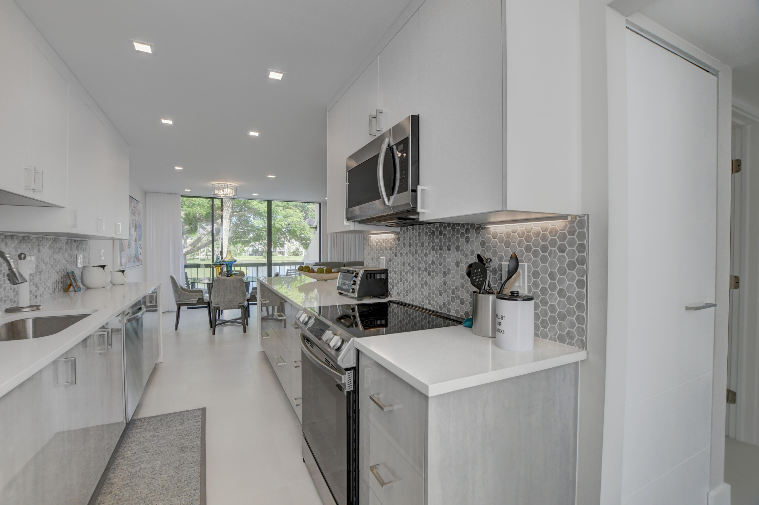 704 Bridgewood Drive Boca Raton, FL 33434 - Photo 9 of 32 11_ebf_0856_57_58_59_60