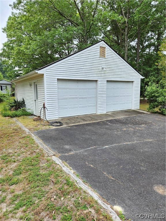 446 Hideaway Point Road Topping, VA 23169 - Photo 21 of 22 a house view with yard
