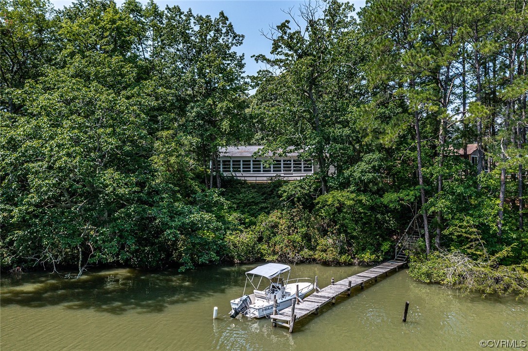 446 Hideaway Point Road Topping, VA 23169 - Photo 6 of 22 a view of a house with a lake view