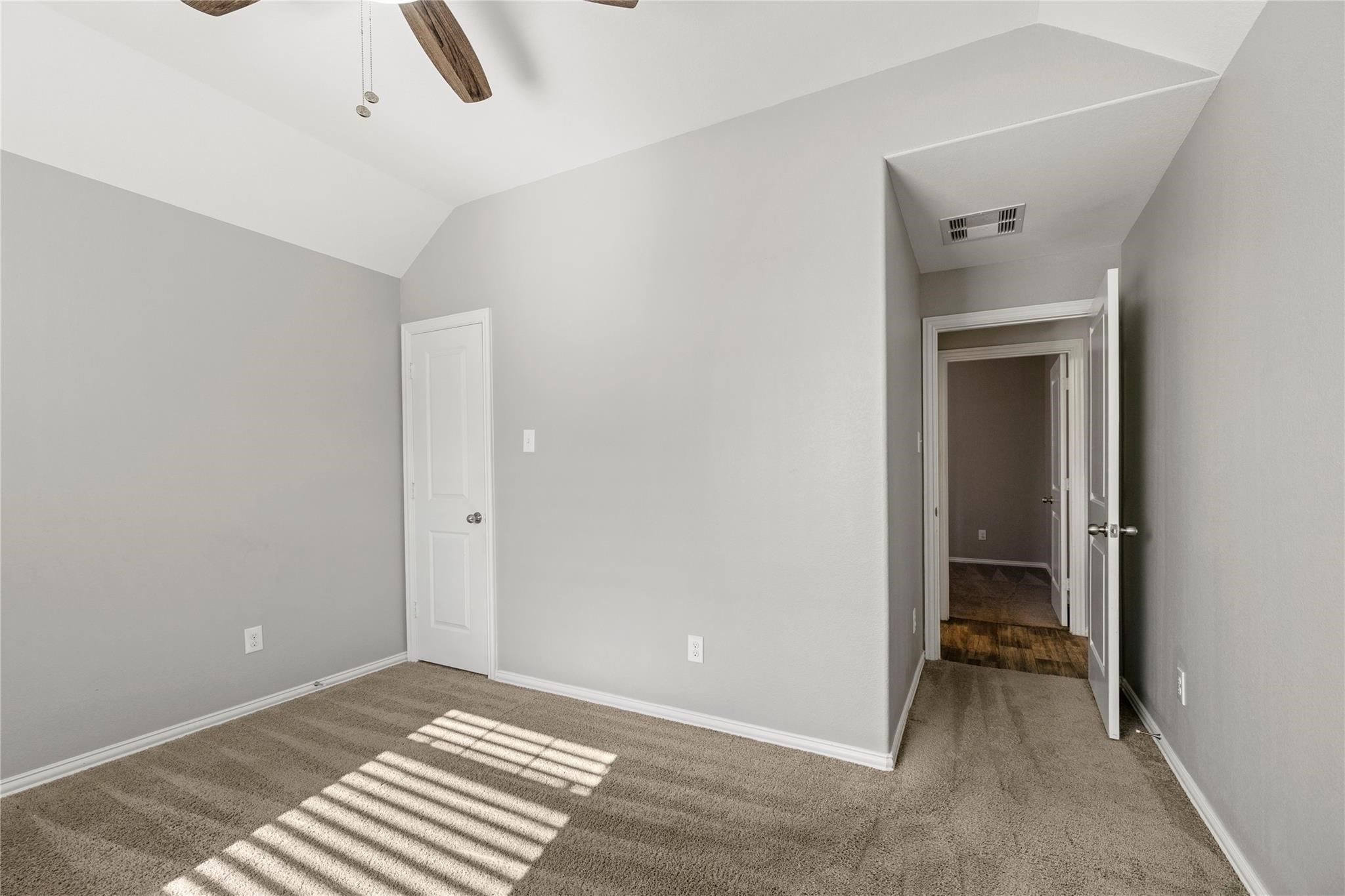 29507 Whitebrush Trace Drive Spring, TX 77386 - Photo 10 of 32 Secondary bedroom with carpet flooring, ceiling fan, and closet access.