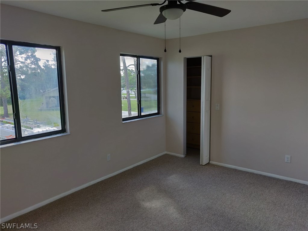 18132 Matanzas Road Fort Myers, FL 33967 - Photo 11 of 22 an empty room with a window