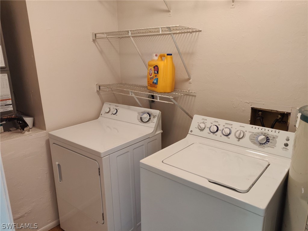 18132 Matanzas Road Fort Myers, FL 33967 - Photo 20 of 22 a utility room with dryer and washer