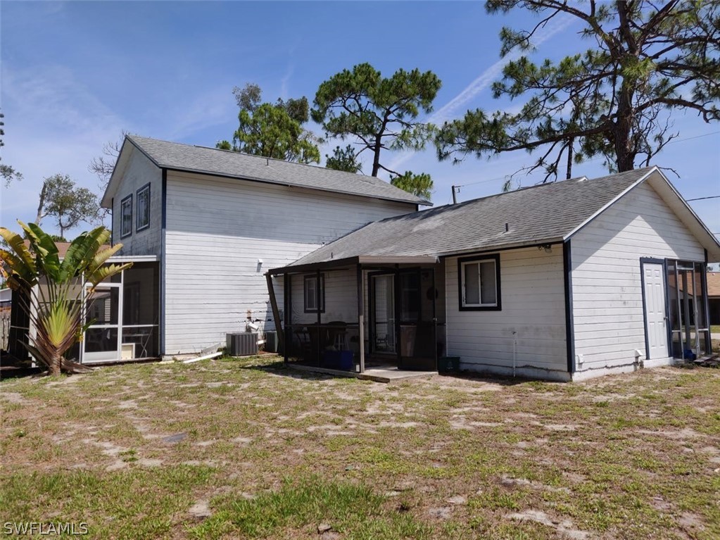 18132 Matanzas Road Fort Myers, FL 33967 - Photo 2 of 22 a house with a outdoor space