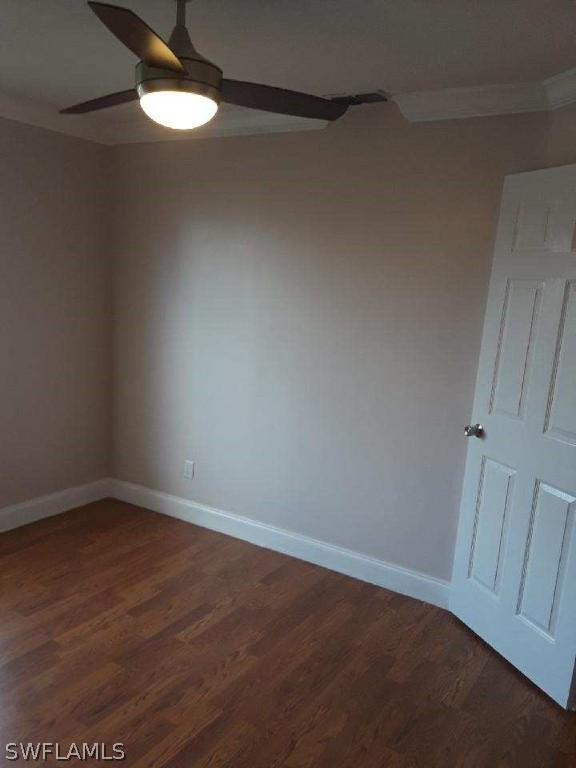 18132 Matanzas Road Fort Myers, FL 33967 - Photo 10 of 22 a view of an empty room with wooden floor and a window