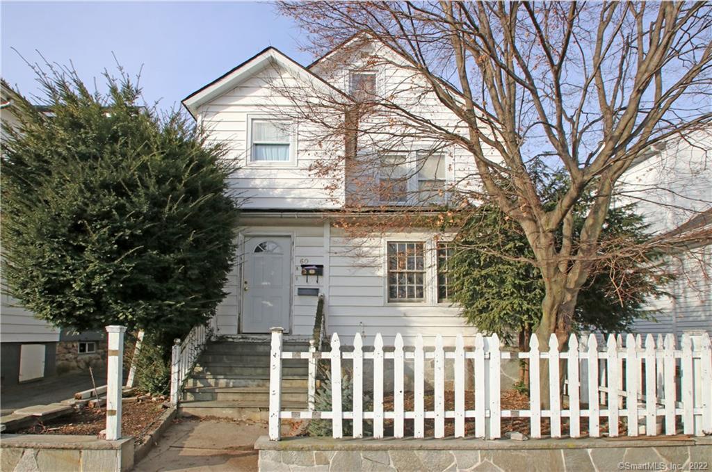 60 Stephen Street Stamford, CT 06902 - Photo 1 of 1 a front view of a house with a tree