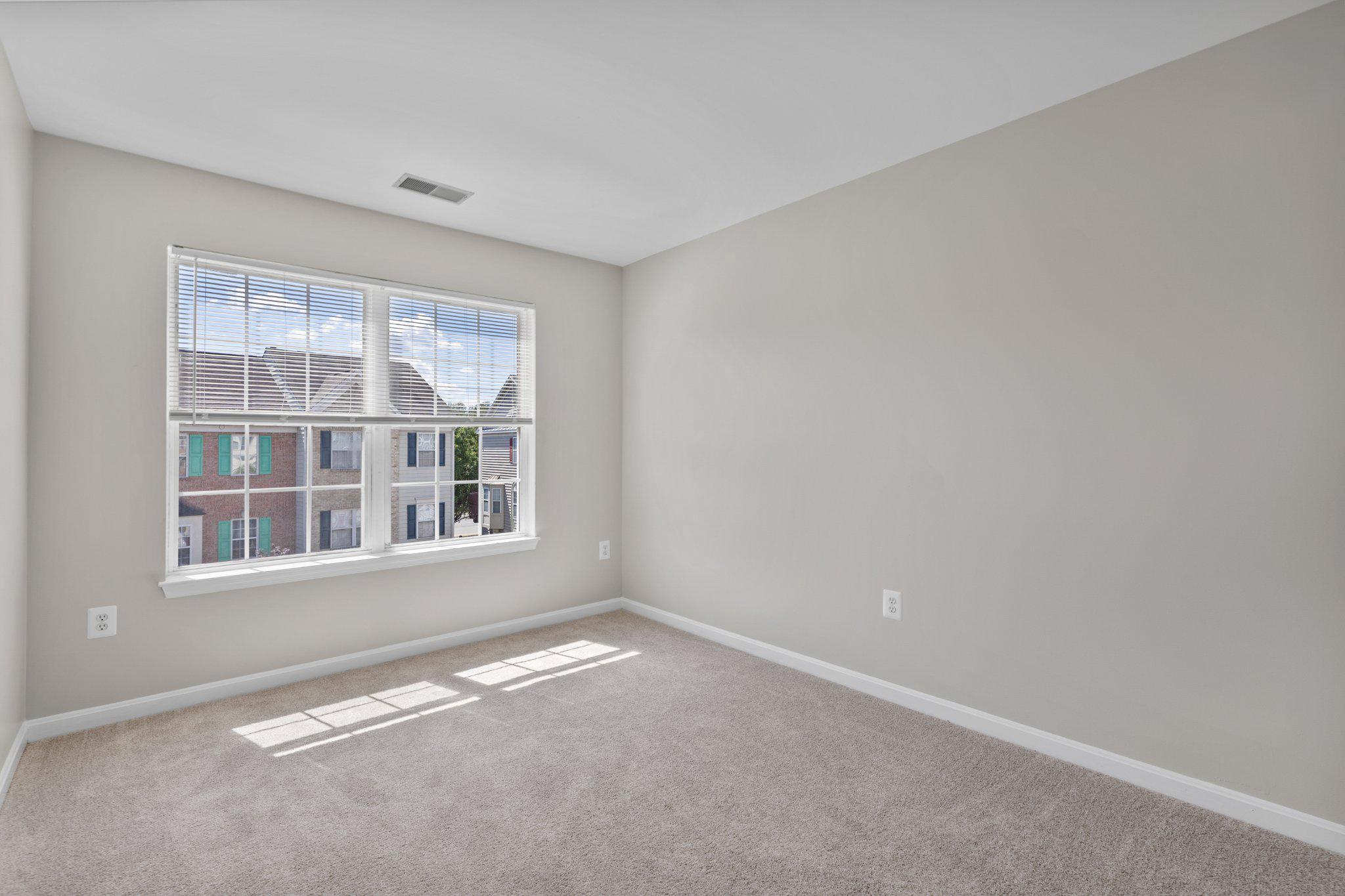 9241 Lorton Valley Road Lorton, VA 22079 - Photo 29 of 45 Bedroom 2 with natural light and new carpet.