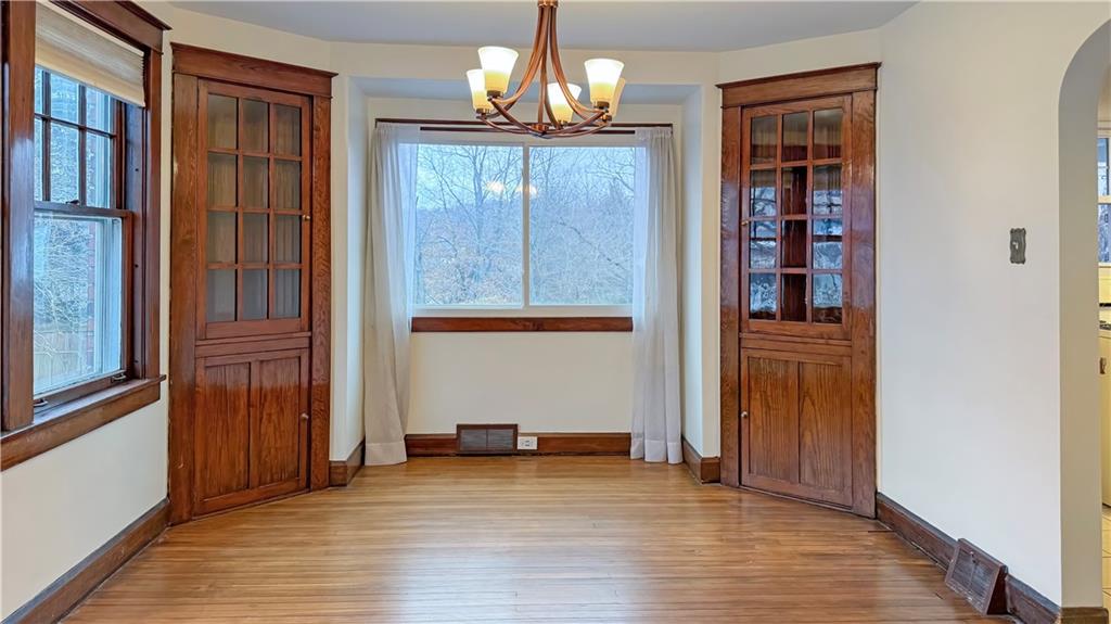 1601 Aurelius Avenue Pittsburgh, PA 15218 - Photo 11 of 30 an empty room with wooden floor closet and windows