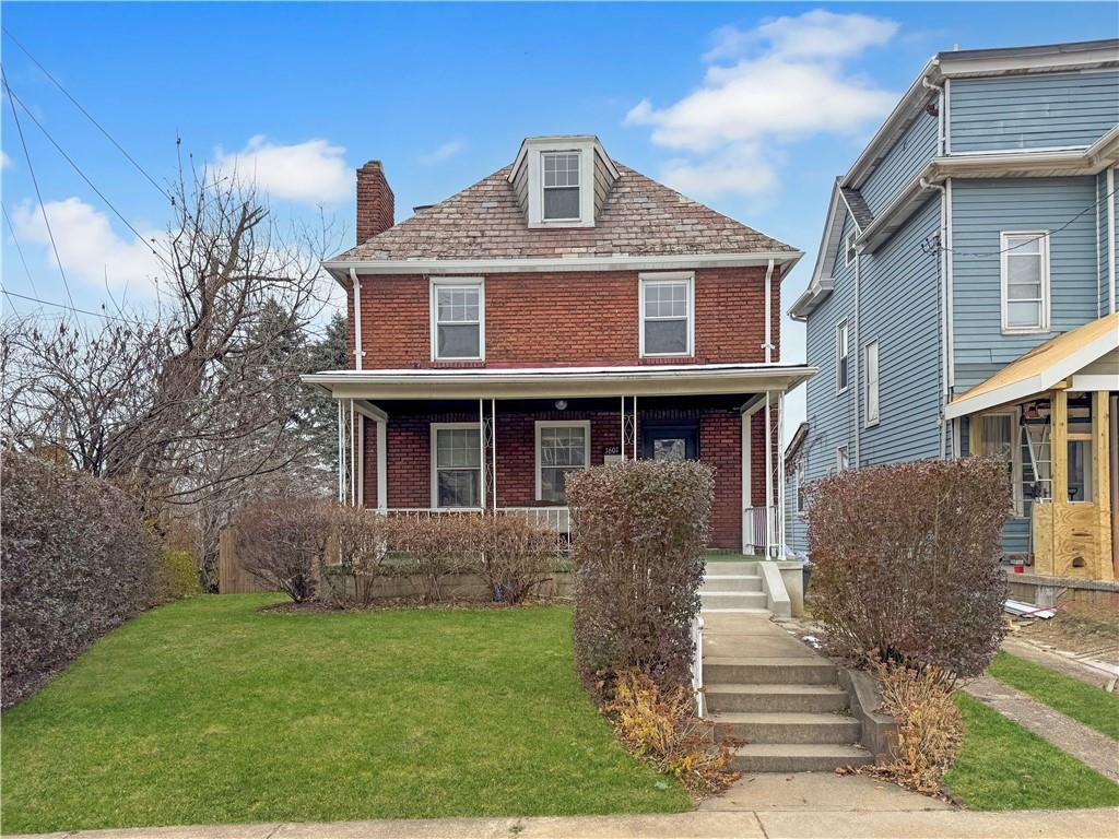 1601 Aurelius Avenue Pittsburgh, PA 15218 - Photo 2 of 30 a front view of a house with garden
