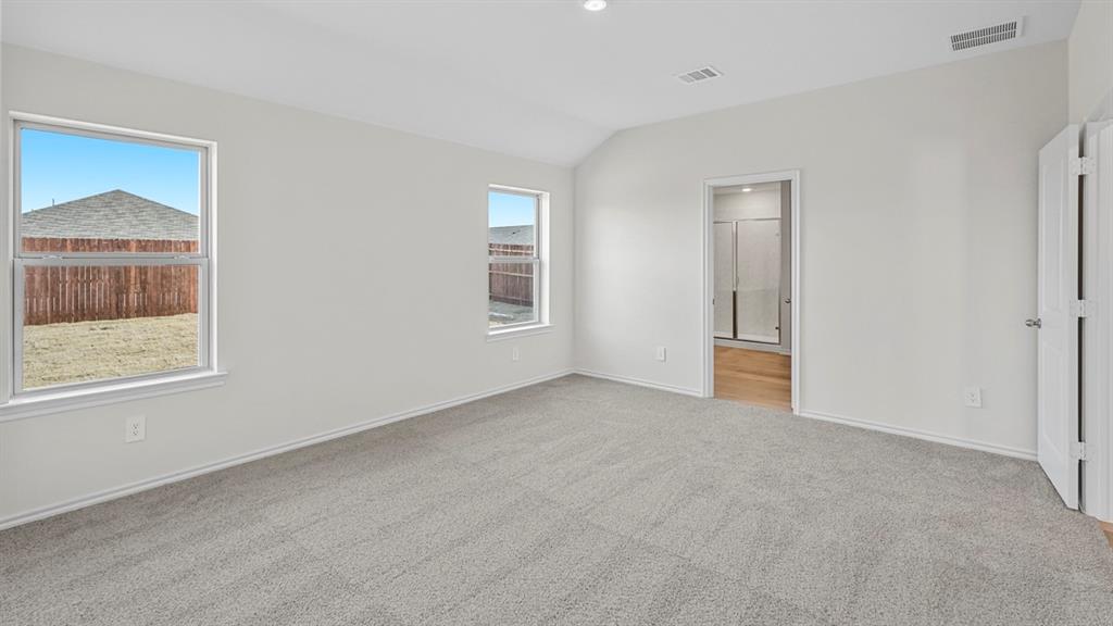 1953 Freeman Street Tyler, TX 75704 - Photo 15 of 32 Spacious room with vaulted ceilings and recessed lighting