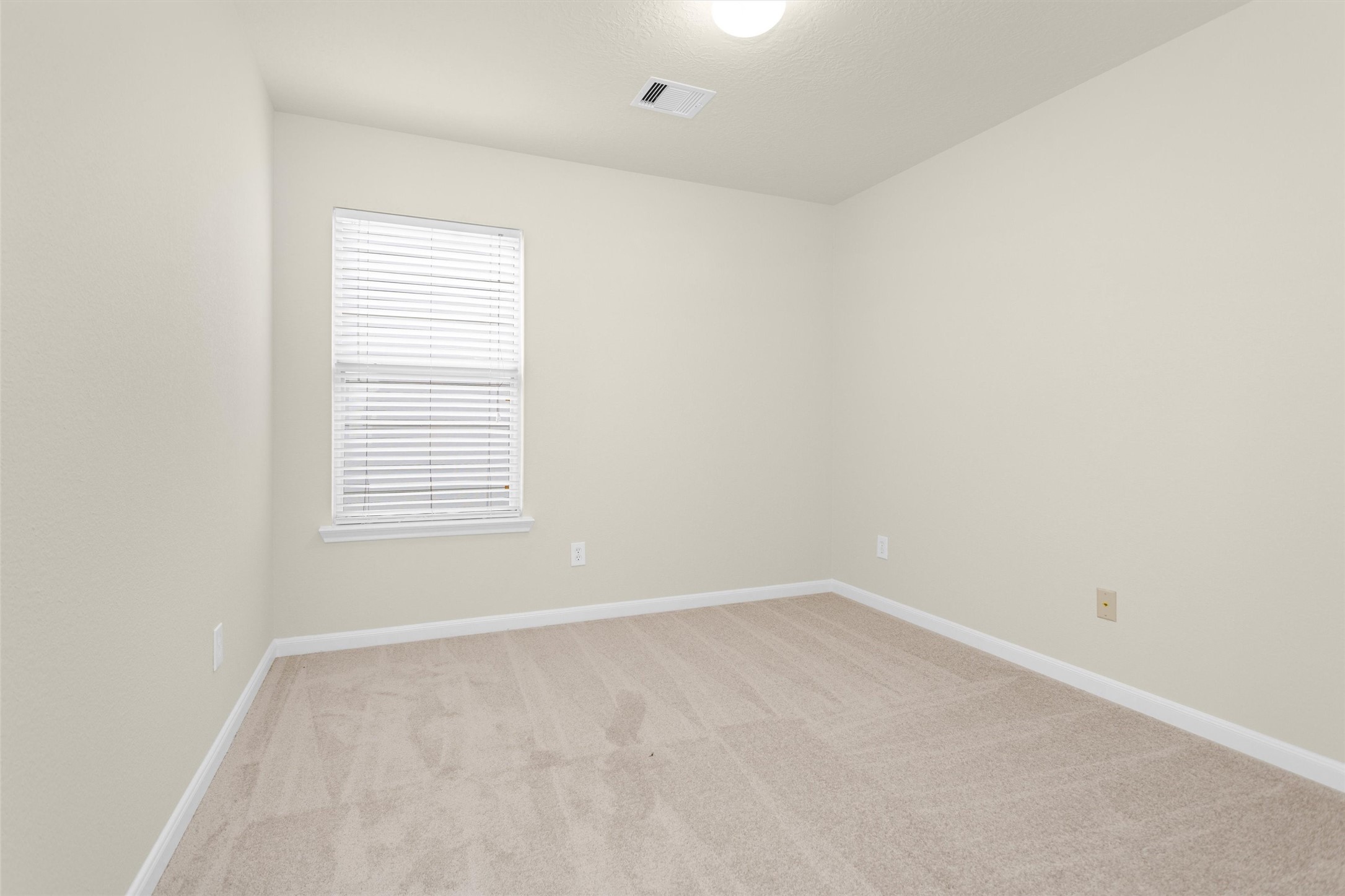 3131 Beacon Grove Street Spring, TX 77389 - Photo 17 of 38 an empty room with a window