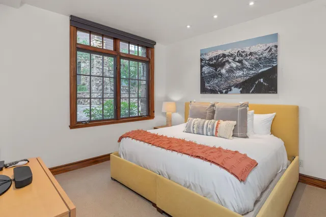 a bathroom with a double vanity sink mirror and double